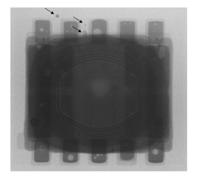 Solder beads (black arrows) are observed using no-clean solder on PCB using SMD land pattern.