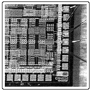 Figure 5. shows a photograph of the lower right part of the 1.9 × 1.8 mm² large chip containing the LNA. In Fig. 6 the chip can be seen as mounted on the substrate and bonded to the printed input and output matching inductors. 