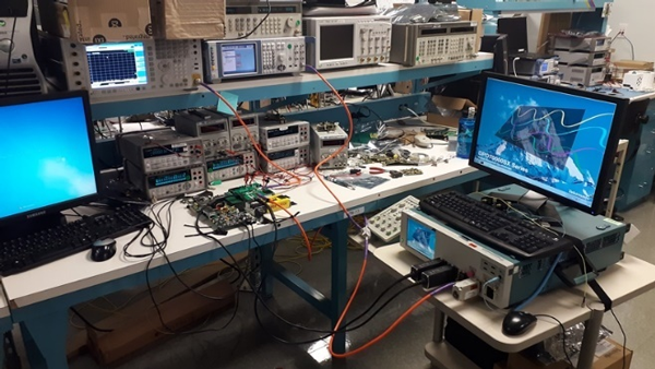 Bench setup with DPO72304SX digital phosphor oscilloscope.