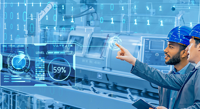 image of 2 men analyzing data collected asbout the fasctory machinery