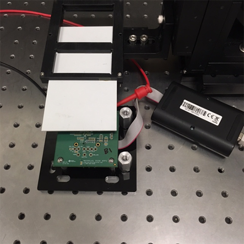 Figure 3. Reflector card on stable optical bench with top secured to avoid vibration.