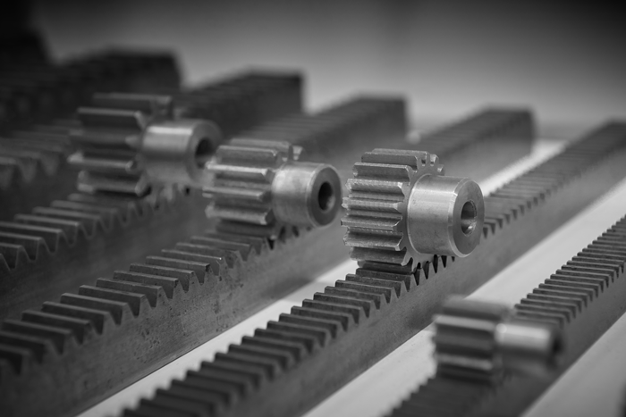 Figure 1. A diagonal view of metal pinion gears on toothed bars with high-precision linear toothed wheels.